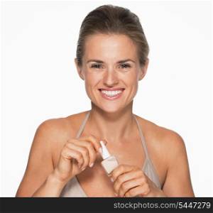 Happy woman opening nail polish