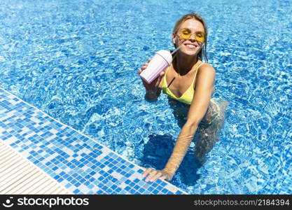 happy woman posing pool