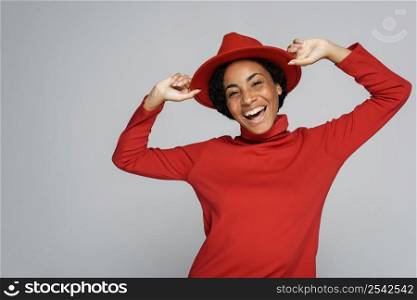 happy woman posing with hat copy space