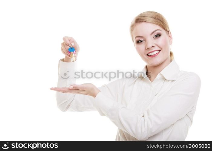 Happy woman real estate agent holding set of keys to new house or car. Property business and accomodation or home buying ownership concept, isolated on white background