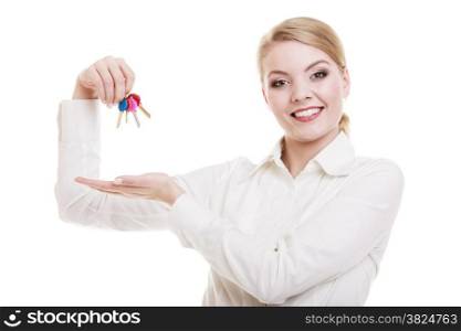Happy woman real estate agent holding set of keys to new house or car. Property business and accomodation or home buying ownership concept, isolated on white background