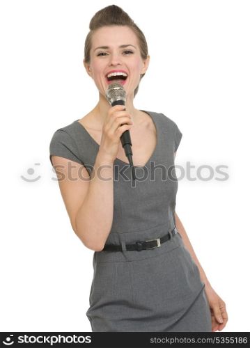 Happy woman singing in microphone. HQ photo. Not oversharpened. Not oversaturated. Happy woman singing in microphone isolated