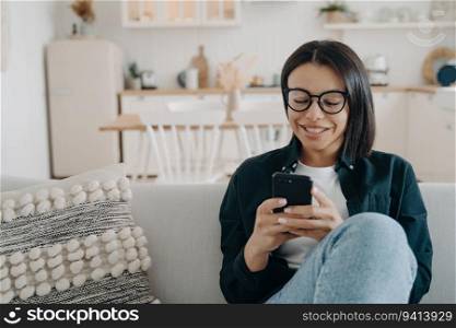 Happy woman using mobile apps, shopping online, chatting on phone. E-commerce, e-banking.