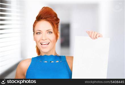 happy woman with blank board in office