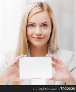 happy woman with blank business or name card. woman with blank business or name card