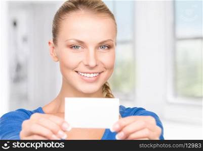 happy woman with business card in office