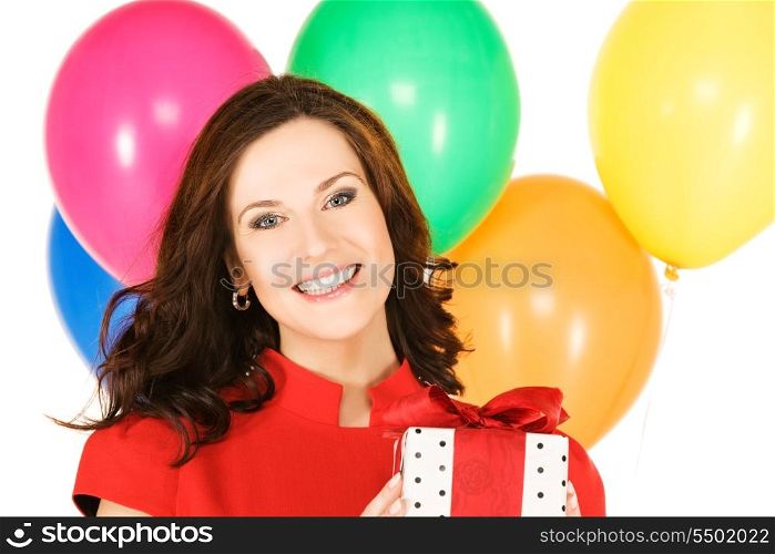 happy woman with gift box and balloons
