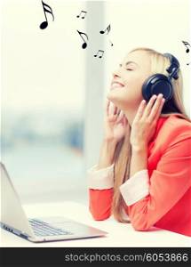 happy woman with headphones listening to music. woman with headphones