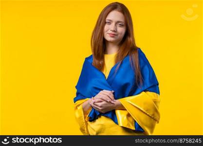 Happy woman with national Ukrainian flag on yellow. Ukraine, patriot, victory in war celebration, banner, Independence day. High quality photo. Happy woman with national Ukrainian flag on yellow. Ukraine, patriot, victory in war celebration, banner, Independence day