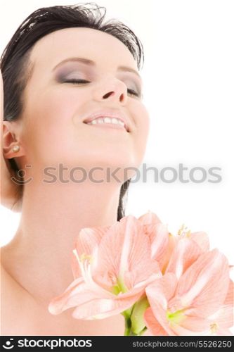 happy woman with pink madonna lily flowers over white