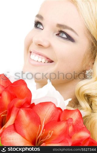 happy woman with red and white lily flowers