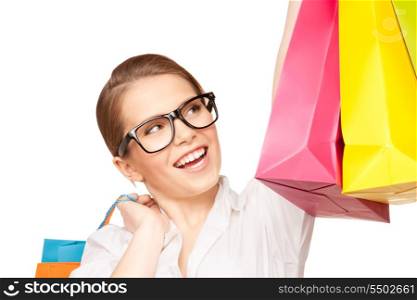 happy woman with shopping bags over white&#xA;