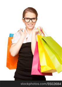 happy woman with shopping bags over white&#xA;
