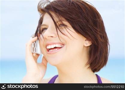 happy woman with white phone (focus on smile)