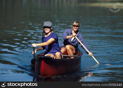 Happy Women Canoeing