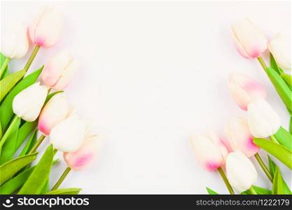 Happy Women&rsquo;s Day, Mother&rsquo;s Day and Valentine&rsquo;s Day concept. top view flat lay Tulip flower on white background, copy space for your text
