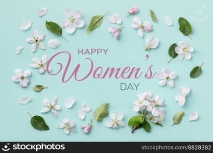 Happy women’s day greeting card made with beautiful flowers on blue background. Flat lay. Spring minimal concept. Flat lay composition for entrepreneurs, bloggers, magazines, websites, social media and instagram