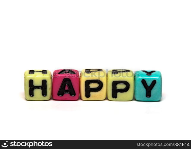 happy - word made from multicolored child toy cubes with letters