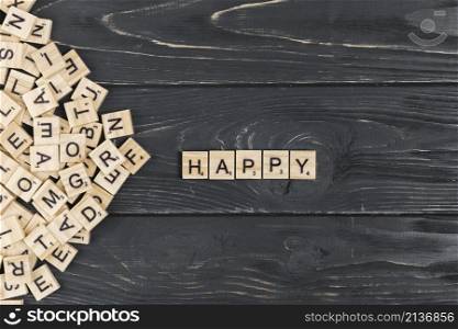 happy word wooden background