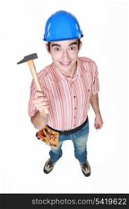 Happy worker holding hammer