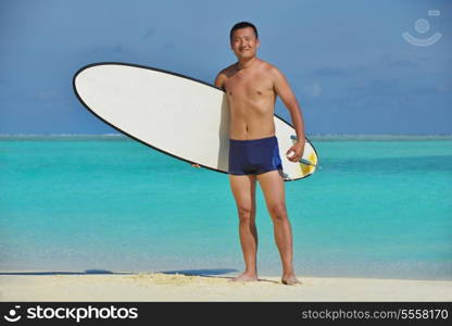 happy young asian couple have fun and romantic time at summer on beautiful white sand beach