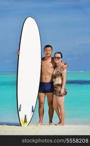 happy young asian couple have fun and romantic time at summer on beautiful white sand beach