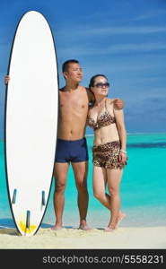 happy young asian couple have fun and romantic time at summer on beautiful white sand beach