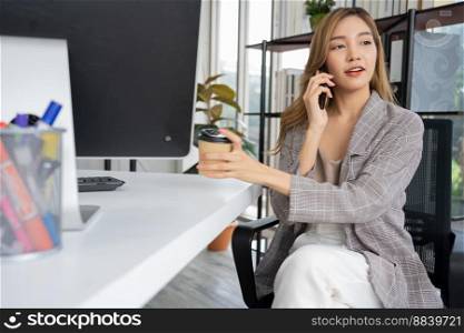 Happy young asian women startup entrepreneur talking whit partner or co-investor and smiling after success sign business contact, Happy girl on workplace. Distance learning online education and work.