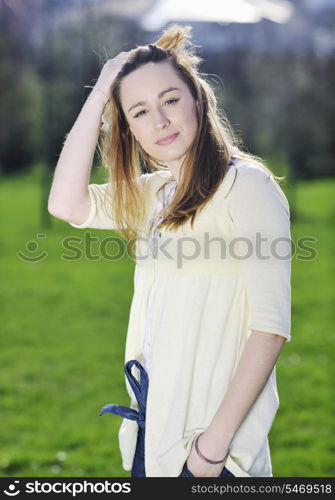 happy young beautiful woman face closeup and portrait outdoor at sunny day