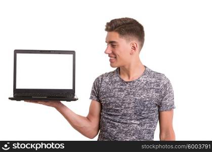 Happy young boy presenting your product on a computer