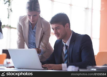 happy young business man portrait in bright modern office indoor