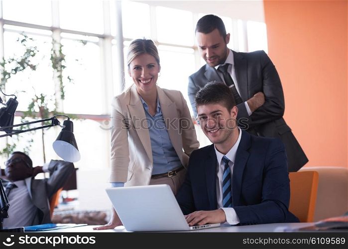 happy young business man portrait in bright modern office indoor