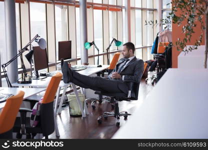 happy young business man portrait in bright modern office indoor