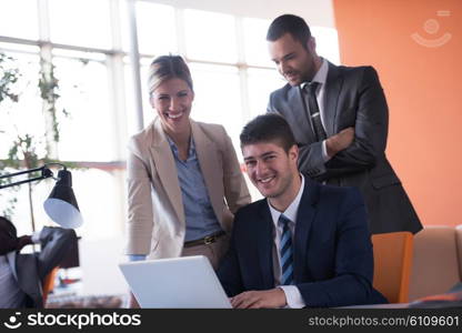 happy young business man portrait in bright modern office indoor