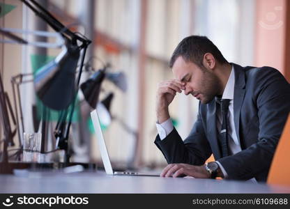 happy young business man portrait in bright modern office indoor