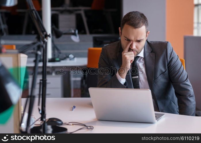 happy young business man portrait in bright modern office indoor