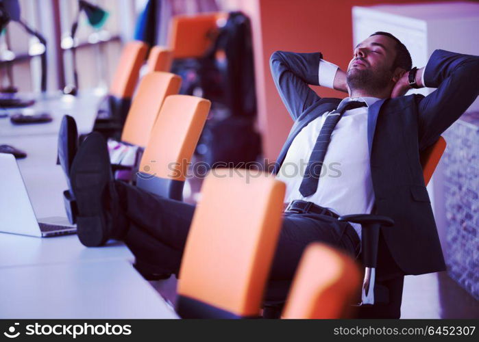 happy young business man portrait in bright modern office indoor