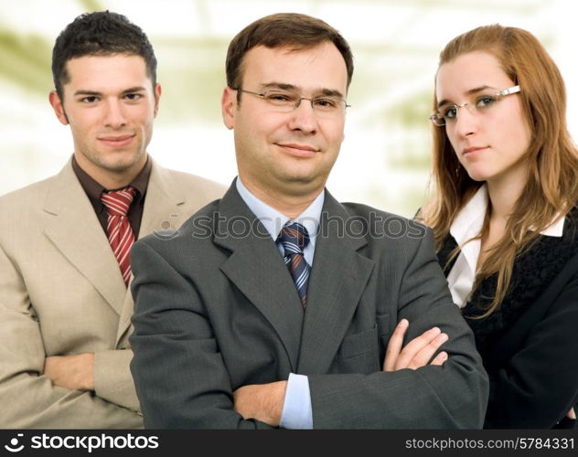 happy young business team standing looking at the camera