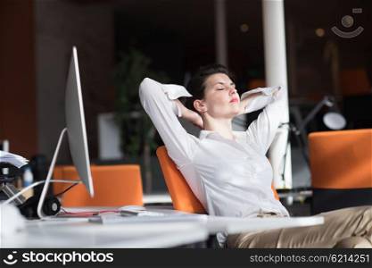 happy young business woman relaxing and geting insiration while working on desktop computer at modern bright starup office interior
