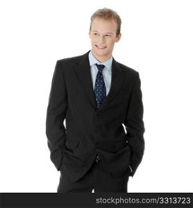Happy young businessman standing, isoalted on white background
