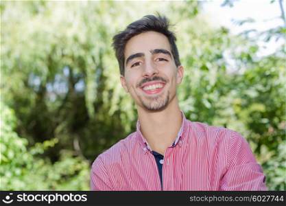 happy young casual man outdoor portrait