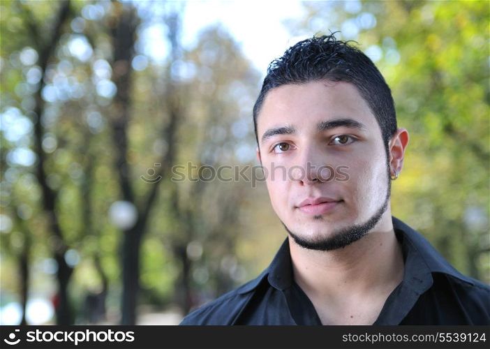 happy young casual man outdoor portrait posing