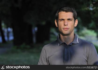 happy young casual man outdoor portrait smiling