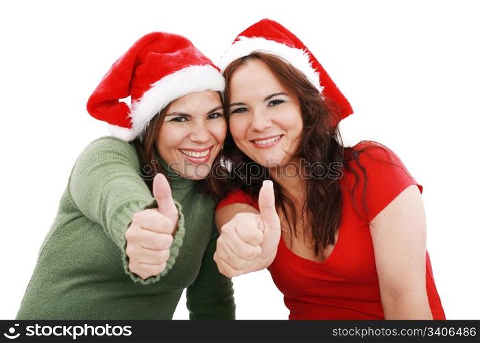 happy young Christmas girls make a sign OK