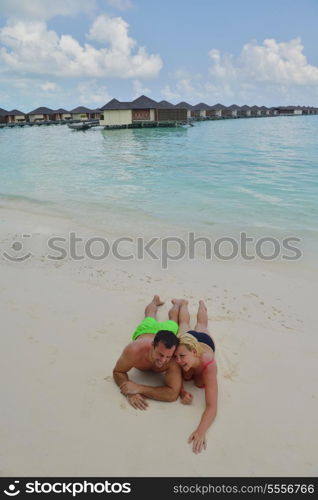 happy young couple at summer vacation have fun and relax at beautiful sunny day