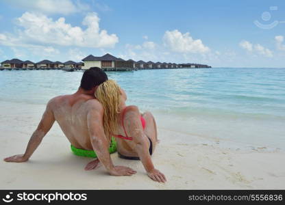 happy young couple at summer vacation have fun and relax at beautiful sunny day