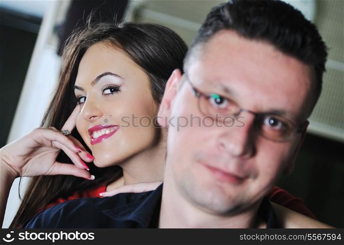 happy young couple have fun indoor