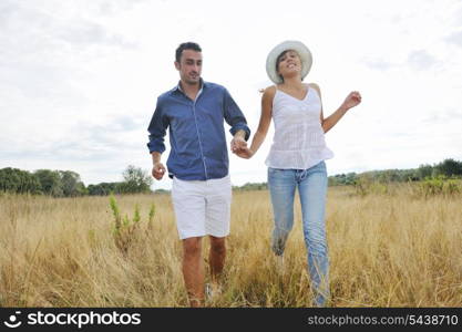 happy young couple have romantic time outdoor while smiling and hug