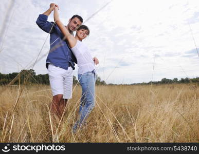 happy young couple have romantic time outdoor while smiling and hug