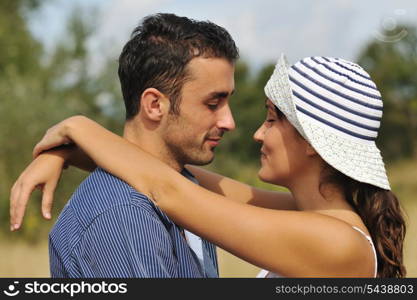 happy young couple have romantic time outdoor while smiling and hug